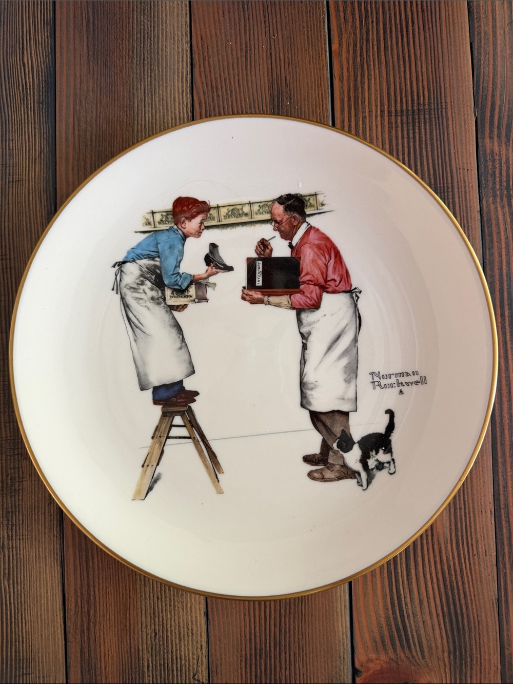 Norman Rockwell Plate - Cream Field with Red and Blue Figures and Gold Rim